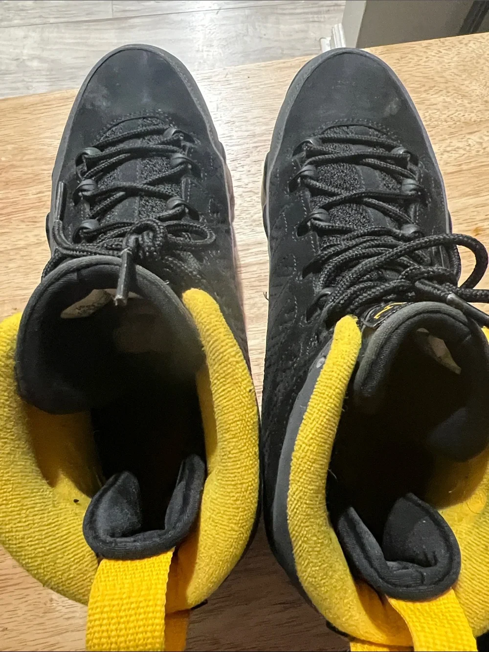 Jordan Black High-Top Sneakers with Yellow Trim